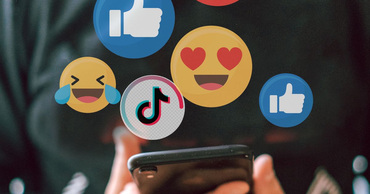 Ícones de curtidas e reações de redes sociais flutuando sobre um smartphone